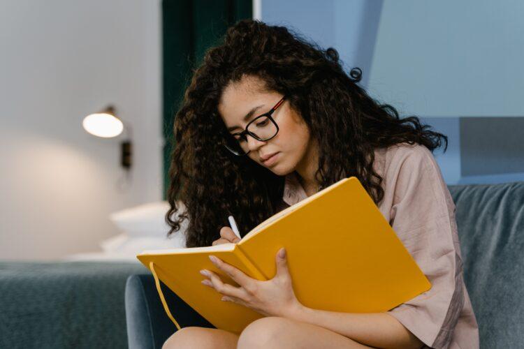 Woman writing down