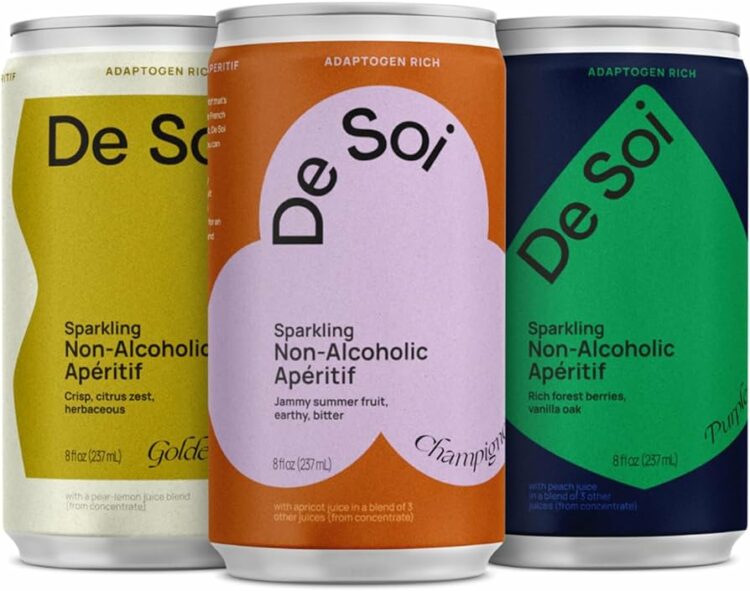 Three colorful cans of De Soi, some of the best non-alcoholic drinks