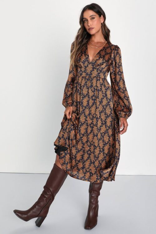 Model wearing a brown and black floral dress with brown boots