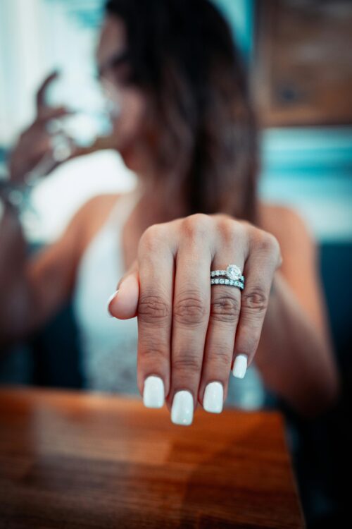 Person showing off one of the correct ways to wear your wedding rings