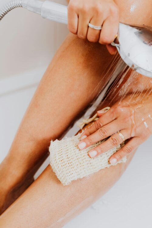 scrubbing skin How to Use Shave Oil