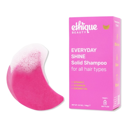 Product shot of pink crescent-shaped shampoo bar from Ethique Beauty