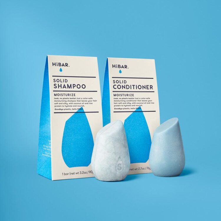 Product shot of slanted-tipped HiBAR shampoo and conditioner bars