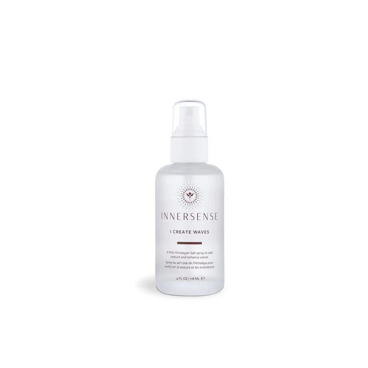 A clear bottle of Innersense I Create Waves, which is one of the best organic hair products